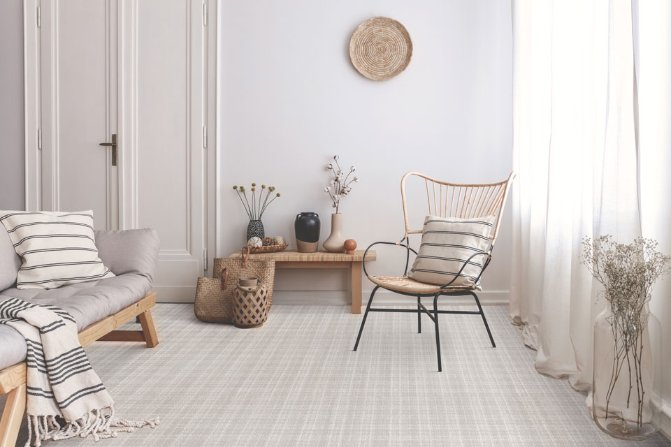 neutral patterned plaid carpet in living room bohemian decor